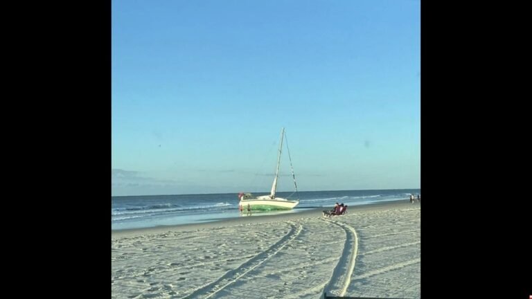 Sailboat Washes Ashore on Myrtle Beach, Drawing Crowds and Curiosity