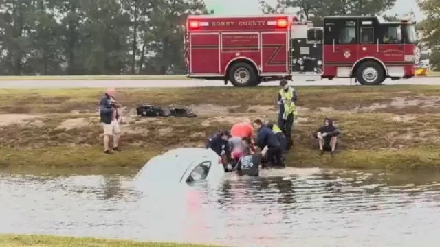 Dramatic Video Shows Woman Pulled From Submerged Car in Pond by Rescuers in South Carolina