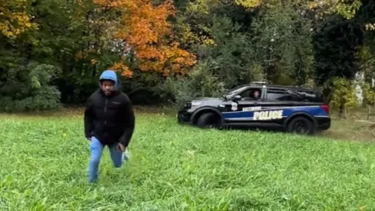 Baltimore Police Officer Suspended After Viral Video Shows Patrol Car Nearly Running A Man Over