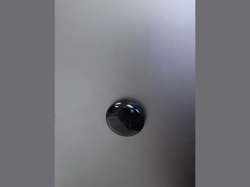 Office Worker Says Boss Glued Crystal to Laptop to “Harmonize Frequencies,” Internet Responds with Sarcasm