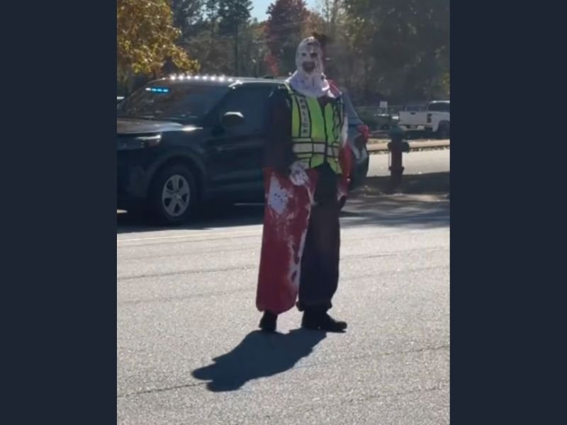 Spartanburg Police Surprise Drivers by Directing Halloween Traffic Dressed as Clowns