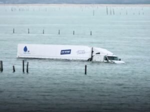 Truck Driver Dies After Semi Plunges Off Chesapeake Bay Bridge-Tunnel in Virginia, Perdue Trailer Found in Water