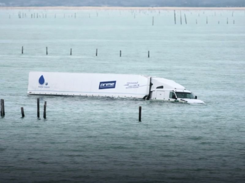 Truck Driver Dies After Semi Plunges Off Chesapeake Bay Bridge-Tunnel in Virginia, Perdue Trailer Found in Water