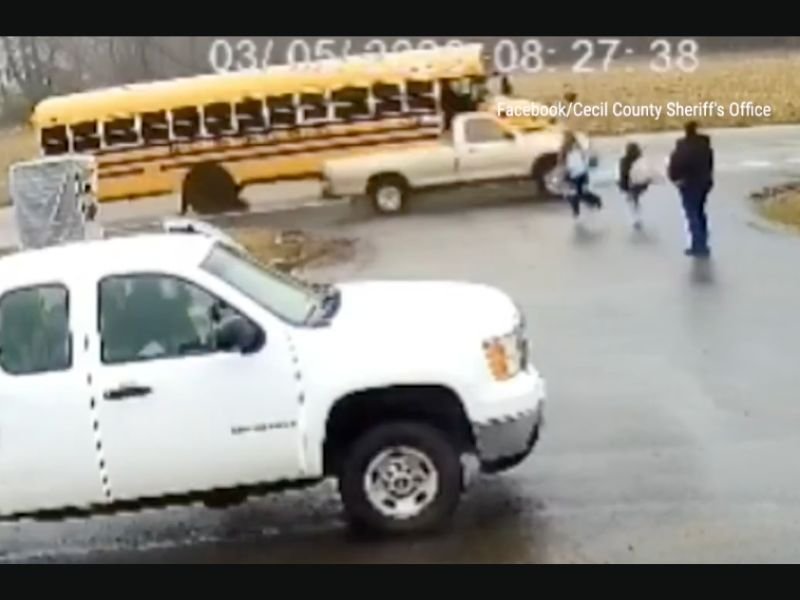 Maryland Deputies Search for Pickup Truck Driver After Video Shows Vehicle Speeding Past Stopped School Bus and Nearly Hitting Two Girls