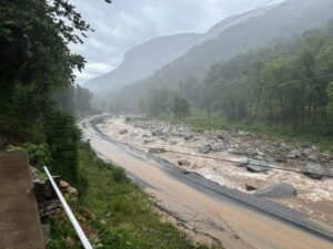 Highway 64 Tested by Raging Floodwaters on the Way Into Chimney Rock North Carolina as Bearwallow Road Washes Out and Gerton to Bat Cave Corridor Faces Additional Damage