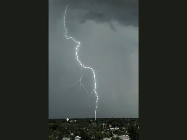 Stunning Lightning Bolt Strikes Church Cross in Largo Florida in a Rare and Dramatically Captured Moment During Active Storm Activity Over the Tampa Bay Region