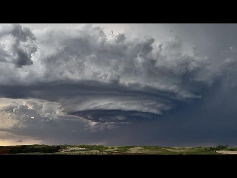 Stunning Supercell Thunderstorm Develops Over Yankton South Dakota Displaying a Perfectly Structured and Visually Spectacular Rotating Wall Cloud Over the Open Plains Landscape