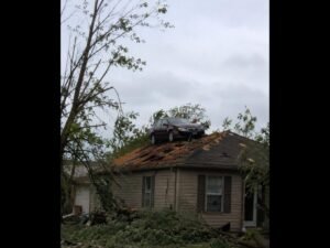 Destructive Tornado Tears Through Streator Illinois Damaging Homes and Structures Across LaSalle County With a Car Found Deposited on Top of a Residential Roof
